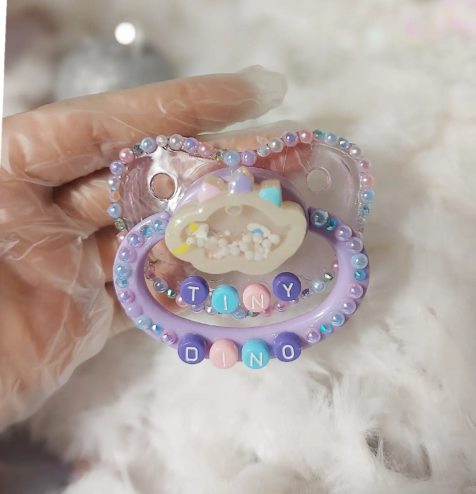 Tiny Dino paci